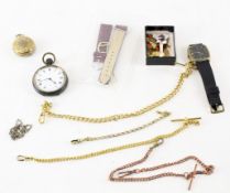 A collection of pocket watches and accessories, including watch chains, enamel badges, watch straps,