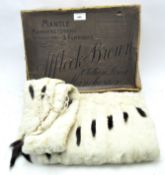 An early 20th century ermine fur stole and muff,