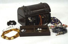 A selection of costume jewellery, including beads, necklaces, buttons and more,