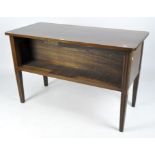 A mahogany hall table with open compartments to the long sides,