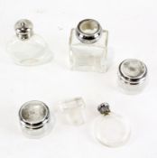A set of five vintage glass perfume bottles,