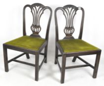 A pair of late 19th-early 20th century mahogany dining chairs,