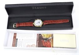 A Stauer automatic moonphase chronograph wristwatch, the white enamel dial with Roman numerals,