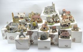 A collection of twenty-one Lilliput lane cottages, of assorted sizes and designs,