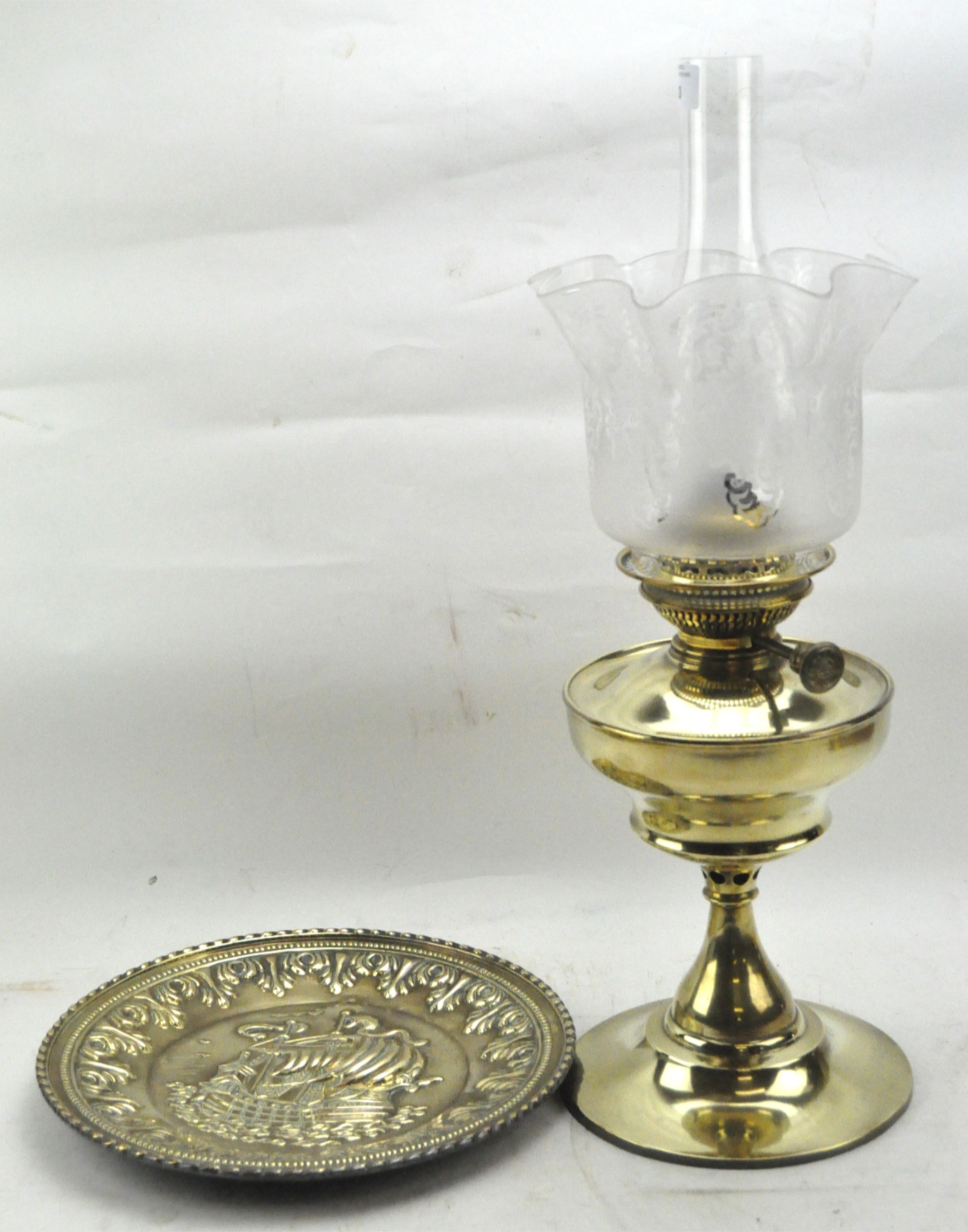 Brass oil lamp and a brass charger
