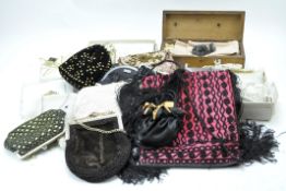 An assortment of vintage fabrics and lady's accessories,