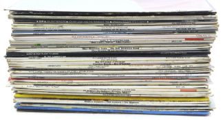 A collection of vintage pop & rock music records,