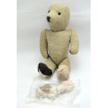 A vintage teddy bear,