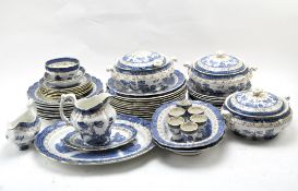 An extensive Booths 'Real Old Willow' dinner service including plates, tureens, suace boat, jug,
