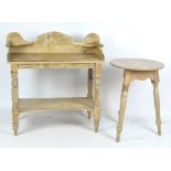 A 20th century pine dressing table and circular table,