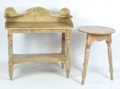 A 20th century pine dressing table and circular table,