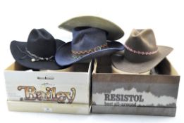 Four cowboy hats,