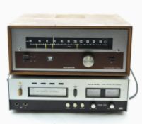 A vintage Rogers Ravensbourne stereo tuner and an 8 track system,