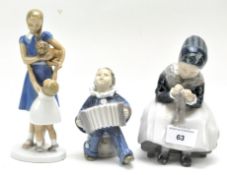 Two Royal Copenhagen ceramic figures and one other,