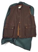 An Orvis brown leather men's gilet,