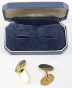 A pair of gents 9ct gold cufflinks, of oval form, hallmarked 375, in original box,