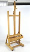 A large artist's studio easel by Mabef,