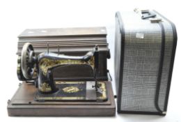 Two vintage sewing machines,