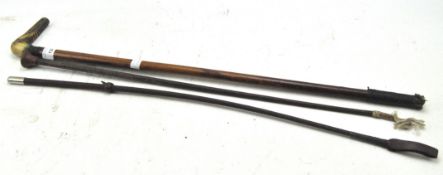 Three leather riding crops, one with horn handle,