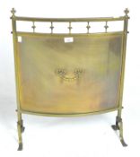 A 20th century fire screen, of curved form,