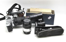 A selection of vintage cameras and lenses,