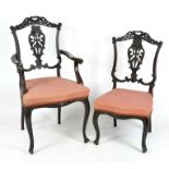 A mahogany carver chair with matching dining chair,