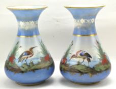 A pair of 20th century glass vases with flared rims,