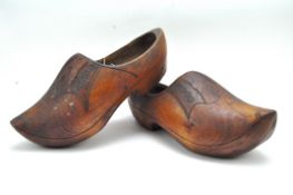 A pair of 20th century wooden clogs,