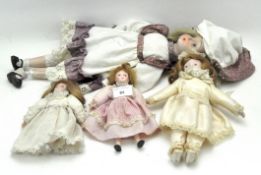 Four 20th century dolls,