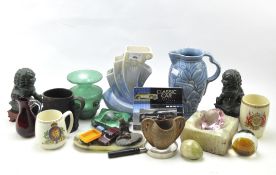 A group of ceramic and stone collectables,