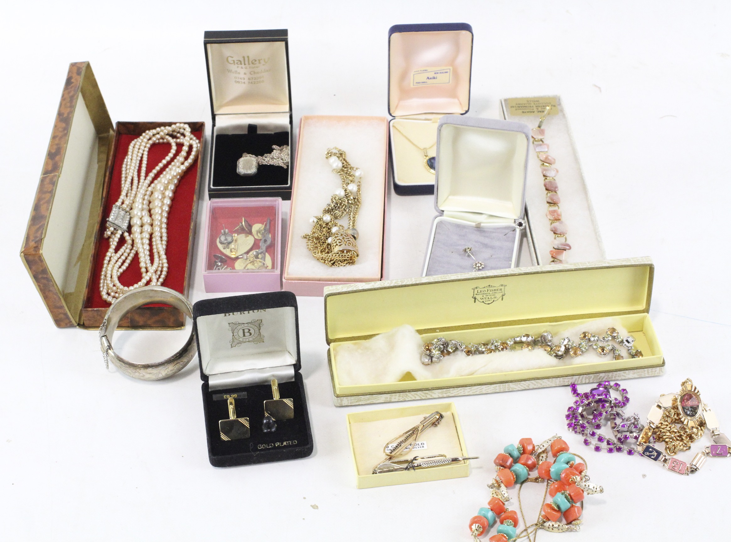 A collection of costume jewellery, including a rolled gold brooch, a 9ct gold cameo ring,