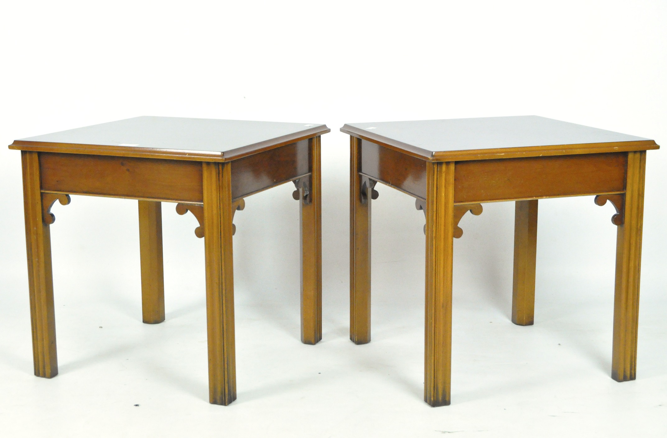 A pair of contemporary wooden coffee tables,