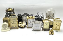 A selection of clocks, including a Koma skeleton clock,