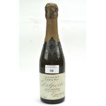A bottle of vintage Jules Delporte champagne dated 1928,