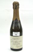 A bottle of vintage Jules Delporte champagne dated 1928,