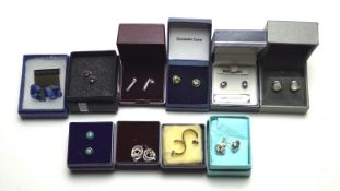 Ten pairs of silver earrings, of assorted sizes and designs,