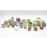 A collection of contemporary glass paperweights,
