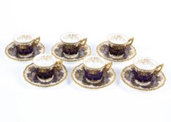 A Coalport blue and gilt ground coffee service, circa 1900, printed green marks,