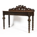 A Victorian carved oak hall table,