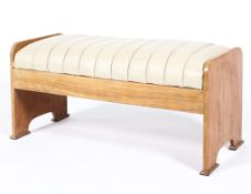 A retro teak white leather mounted rectangular stool, on arched rectangular side supports