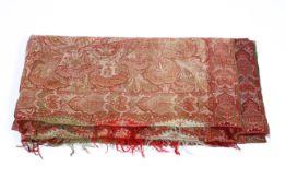 A vintage Kashmiri style paisley throw, woven in red, green,