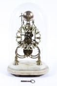 A vintage striking brass skeleton clock on white marble base under glass dome,