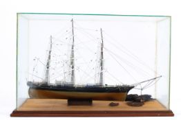 A glass cased scratch built model of 'The Cutty Sark' a three mast sailing ship with small piece of