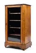 A Victorian burr walnut glazed music cabinet,