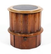 A 19th century walnut cylindrical commode cabinet,