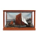A glass cased diorama of a late 19th century harbour scene,
