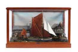 A glass cased diorama of a late 19th century harbour scene,