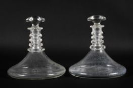 Pair of quadruple ring neck ships decanters and stoppers, each in the Regency style, later in date,