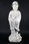 A large Chinese blanc-de-chine figure of a guanyin, 20th century,