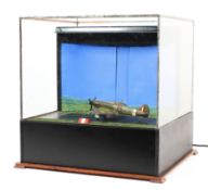 An electrified Scratch built diorama model of a Hurricane preparing to take off